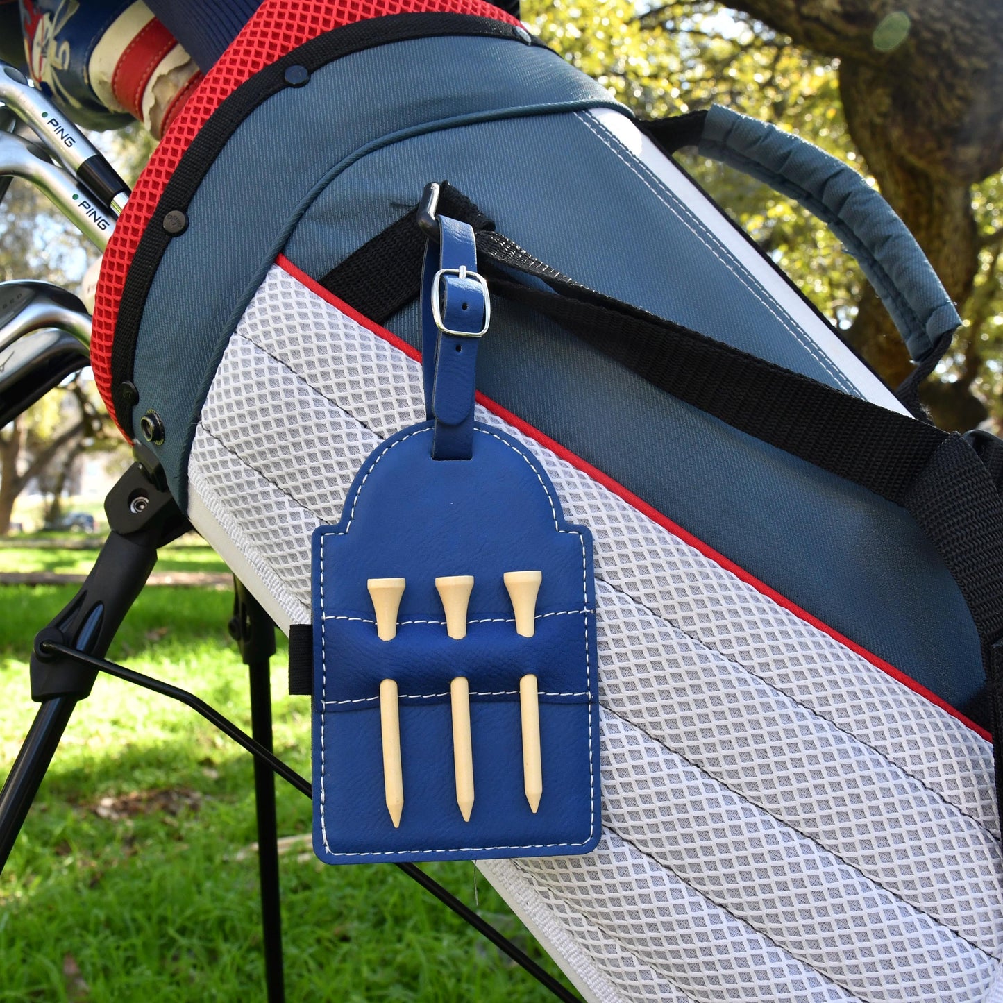 a close up of a golf bag on a chair