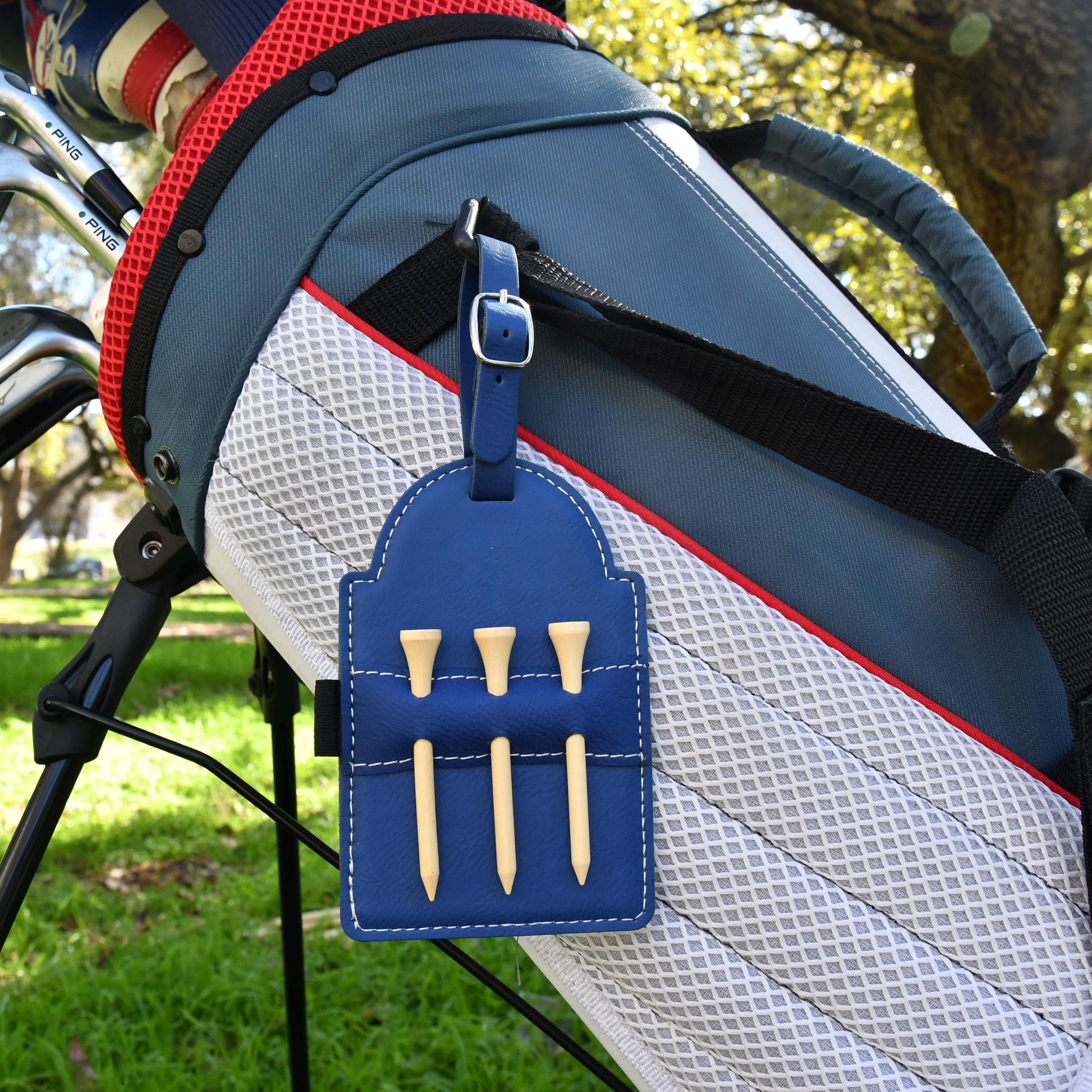 a close up of a golf bag on a chair