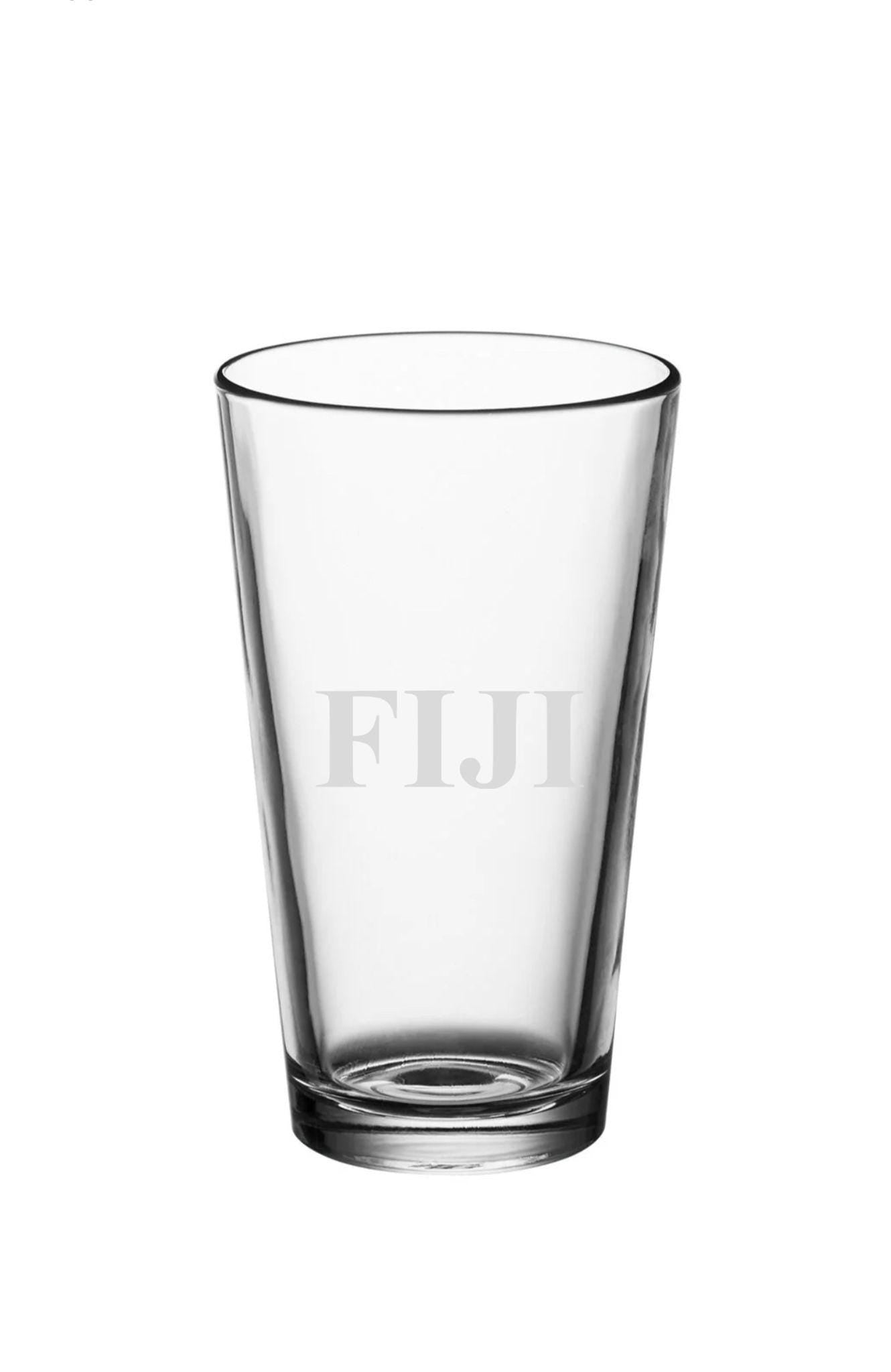 a shot glass with the word fiji on it