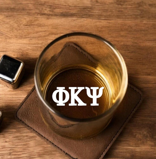 Custom Phi Kappa Psi (Phi Psi) whiskey glass featuring engraved Greek letters, perfect for fraternity events, Big/Little reveals, alumni gatherings, and other Greek life occasions. High-quality glass designed for long-lasting use.