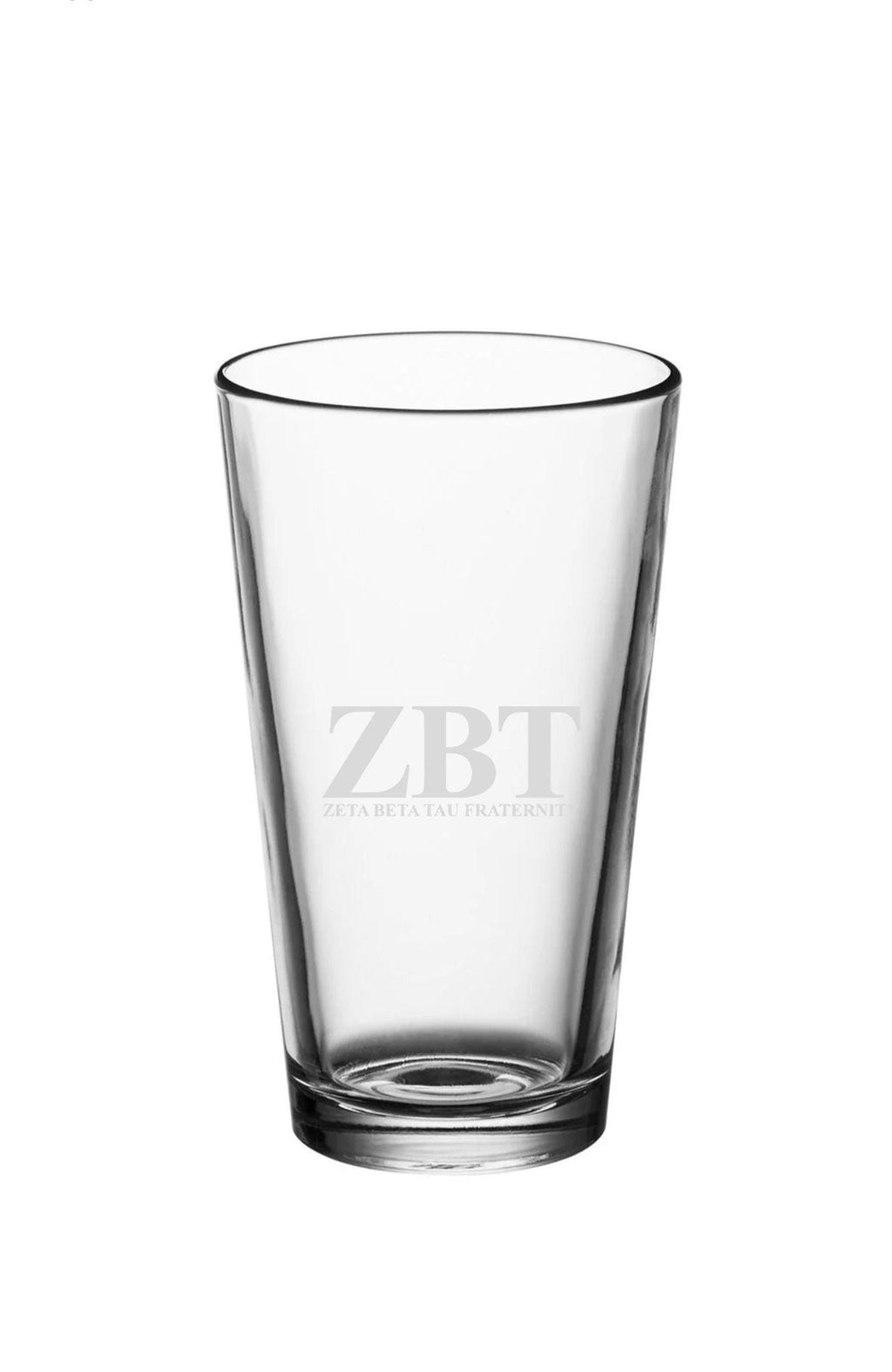 a shot glass with a white logo on it